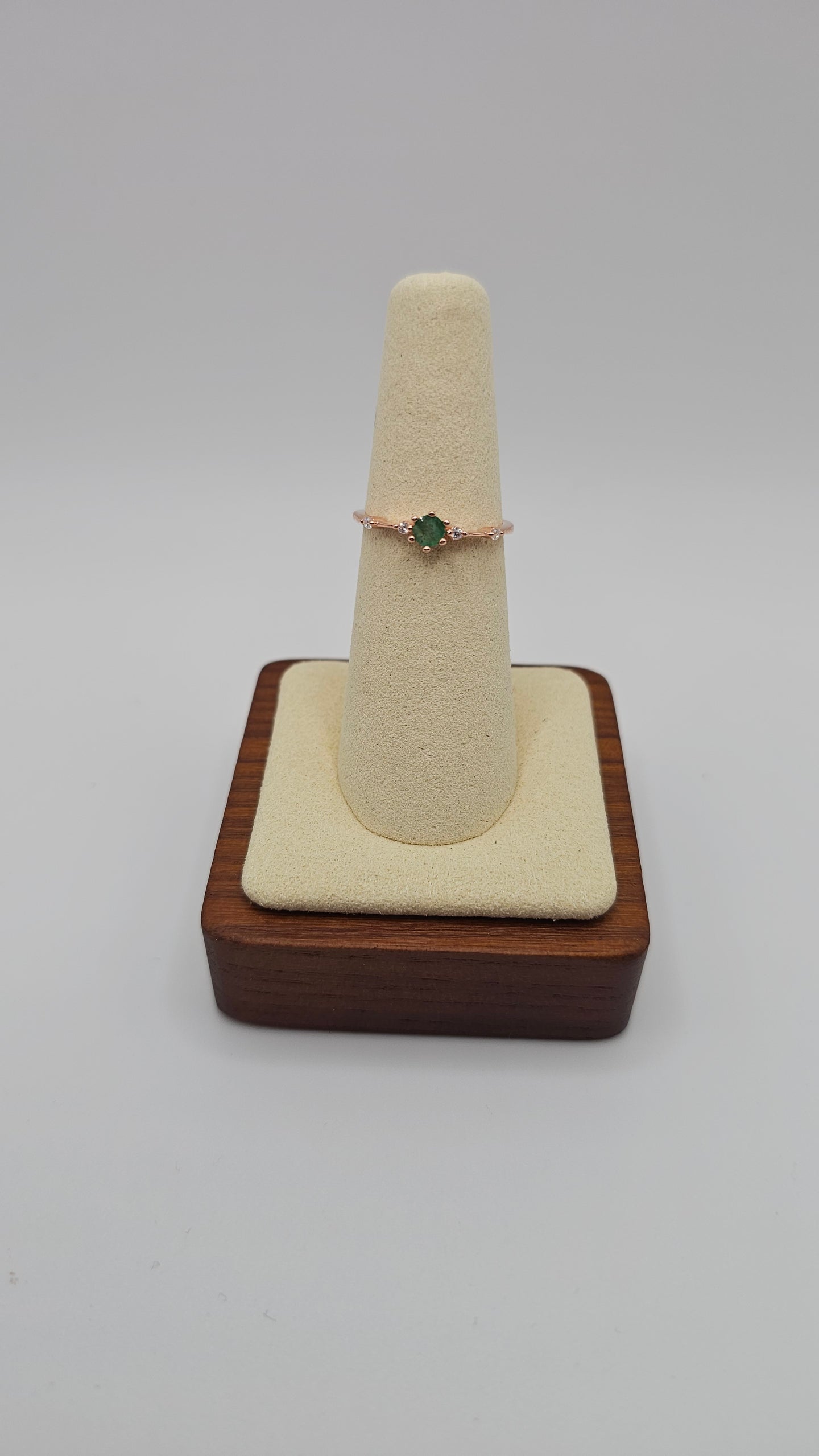 emerald solitaire in 14k rose gold ring